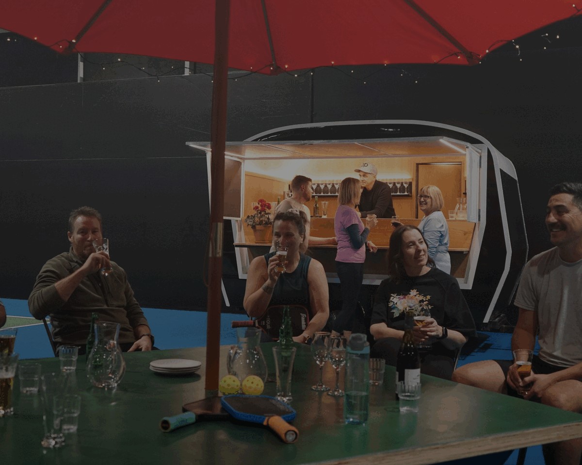 Friends together over drinks after a game